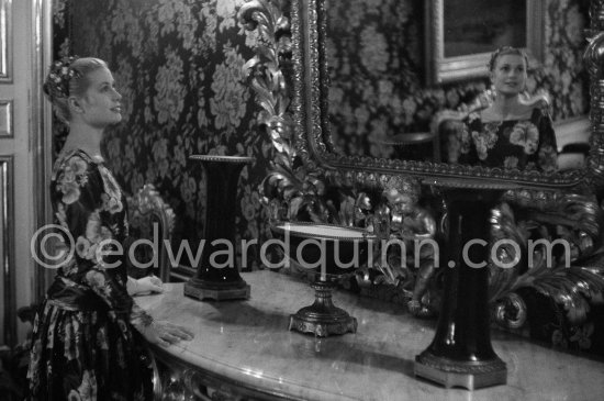 Grace Kelly (later to become Princess Grace) at the Royal Palace just before she met Prince Rainier for the first time. One of Prince Rainier’s personal servants, Michel Demorizi, guided her around some of the great number of rooms of the Royal Palace. Monaco 1955. - Photo by Edward Quinn