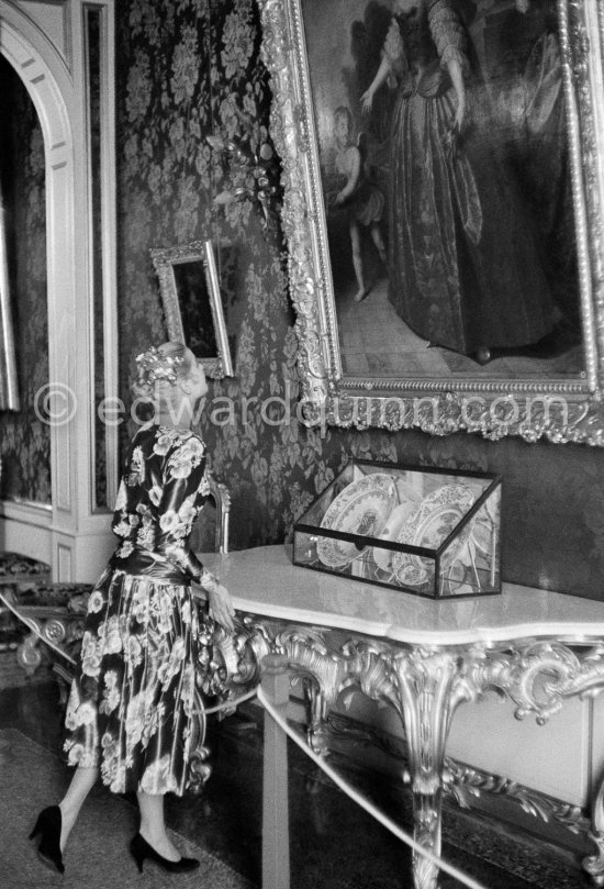 Grace Kelly (later to become Princess Grace) at the Royal Palace just before she met Prince Rainier for the first time. One of Prince Rainier’s personal servants, Michel Demorizi, guided her around some of the great number of rooms of the Royal Palace. Monaco 1955. - Photo by Edward Quinn