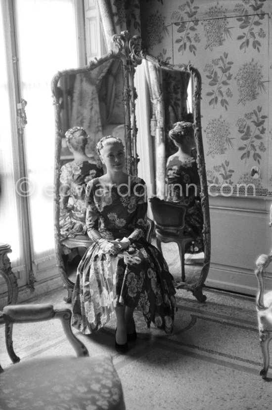 Grace Kelly (later to become Princess Grace) at the Royal Palace just before she met Prince Rainier for the first time. One of Prince Rainier’s personal servants, Michel Demorizi, guided her around some of the great number of rooms of the Royal Palace. Monaco 1955. - Photo by Edward Quinn