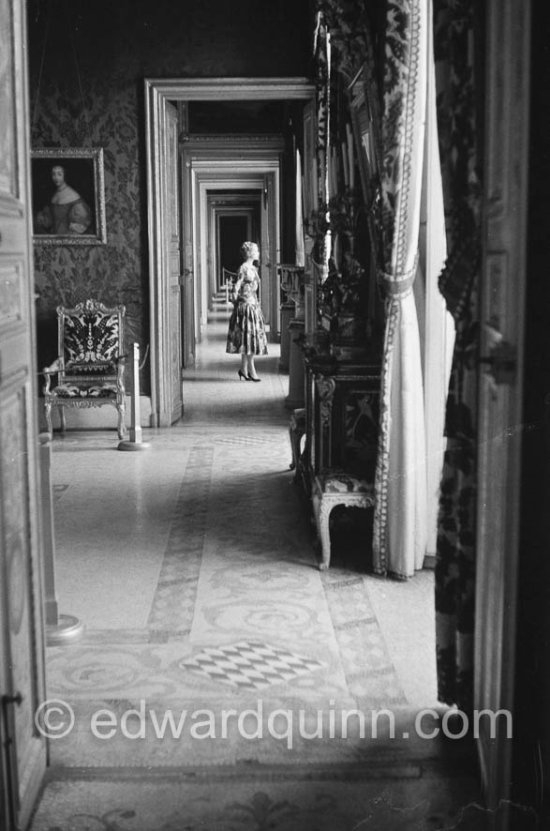 Grace Kelly (later to become Princess Grace) at the Royal Palace just before she met Prince Rainier for the first time. One of Prince Rainier’s personal servants, Michel Demorizi, guided her around some of the great number of rooms of the Royal Palace. Monaco 1955. - Photo by Edward Quinn