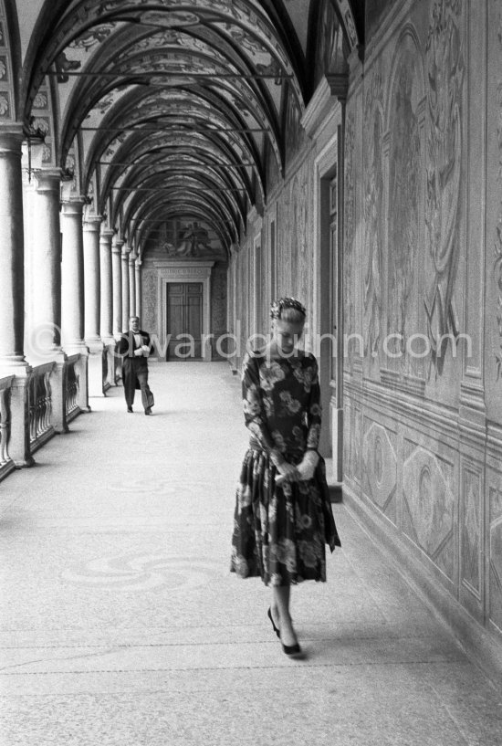 Grace Kelly (later to become Princess Grace) at the Royal Palace just before she met Prince Rainier for the first time. One of Prince Rainier’s personal servants, Michel Demorizi, guided her around some of the great number of rooms of the Royal Palace. Monaco 1955. - Photo by Edward Quinn