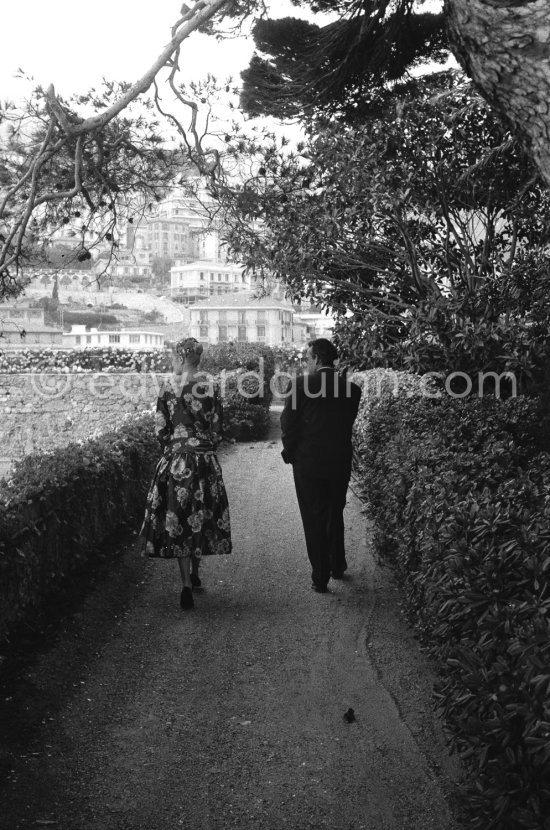 Grace Kelly’s first meeting with Prince Rainier, the man who would become her husband, 1955. To break the ice between two shy people it was decided they should go for a walk in the palace gardens. The couple were married in Monaco the following Year. Monaco 1955. - Photo by Edward Quinn