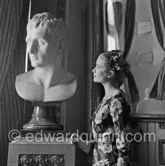 Grace Kelly (later to become Princess Grace) at the Royal Palace just before she met Prince Rainier for the first time. One of Prince Rainier’s personal servants, Michel Demorizi, guided her around some of the great number of rooms of the Royal Palace. Monaco 1955. - Photo by Edward Quinn