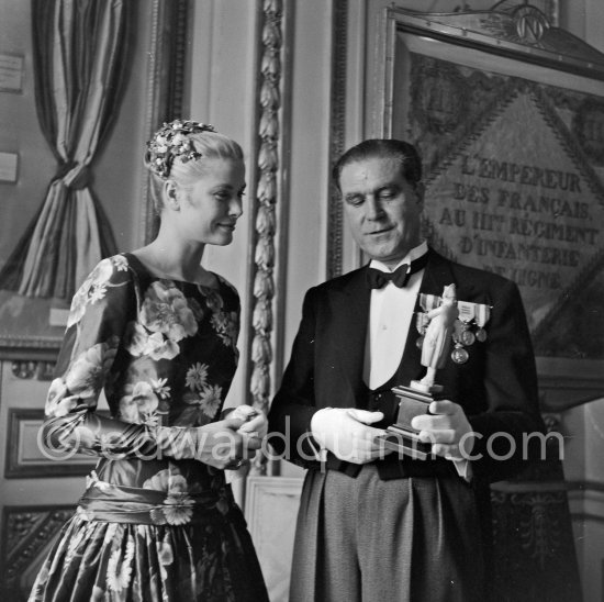 Grace Kelly (later to become Princess Grace) at the Royal Palace just before she met Prince Rainier for the first time. One of Prince Rainier’s personal servants, Michel Demorizi, guided her around some of the great number of rooms of the Royal Palace. Monaco 1955. - Photo by Edward Quinn