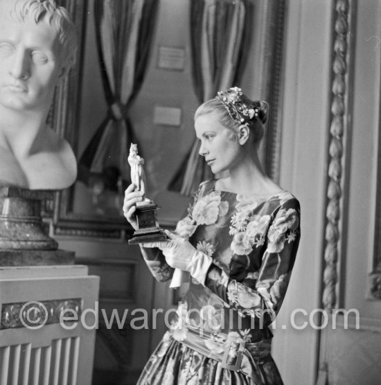 Grace Kelly (later to become Princess Grace) at the Royal Palace just before she met Prince Rainier for the first time. One of Prince Rainier’s personal servants, Michel Demorizi, guided her around some of the great number of rooms of the Royal Palace. Monaco 1955. - Photo by Edward Quinn