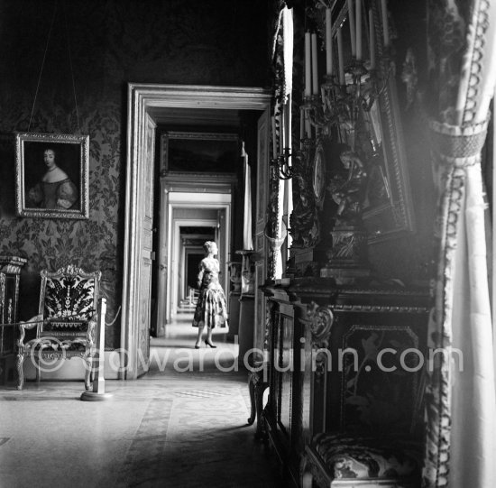 Grace Kelly (later to become Princess Grace) at the Royal Palace just before she met Prince Rainier for the first time. One of Prince Rainier’s personal servants, Michel Demorizi, guided her around some of the great number of rooms of the Royal Palace. Monaco 1955. - Photo by Edward Quinn