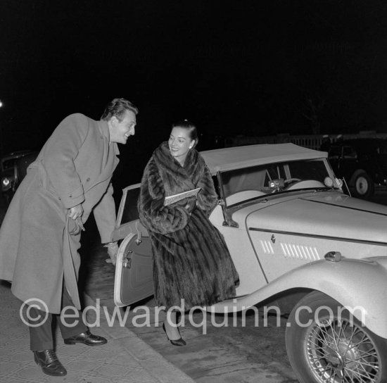 Kerima, Arab actress, and husband Alexis Revides arrive for the New Year’s Eve gala dinner. Hotel de Paris. Monte Carlo 1954. Car: 1953 or 1954 MG TF - Photo by Edward Quinn