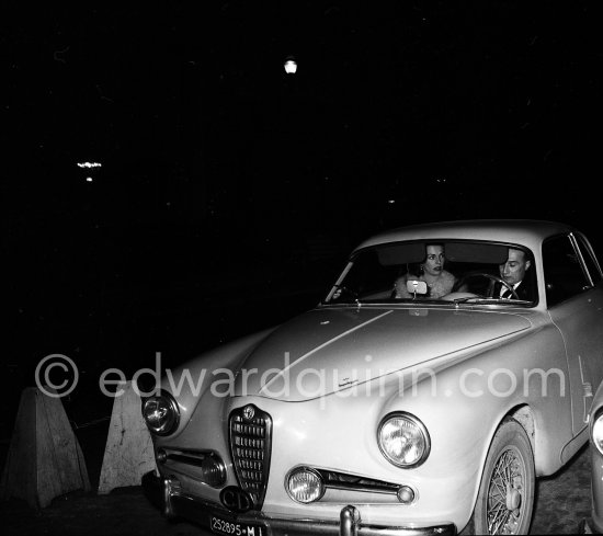 Miss Hannon, "mysterieous date of Prince Aly Khan", as the magazine "Paris Match" wrote, in his car driven by a concierge of the Hotel de Paris. After New Year’s Eve Gala dinner. Monte Carlo 1954. Car: Alfa Romeo 1900C Series 2 Sprint Coupé 1954. - Photo by Edward Quinn