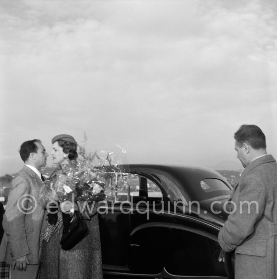 Prince Aly Khan and Begum Aga Khan, who is leaving for India for the 77th birthday of the Aga Khan. Nice Airport 1954. Car: 1952 Rolls-Royce Phantom IV, #4AF20, Sedanca de Ville by Hooper. Detailed info on this car by expert Klaus-Josef Rossfeldt see About/Additional Infos. - Photo by Edward Quinn