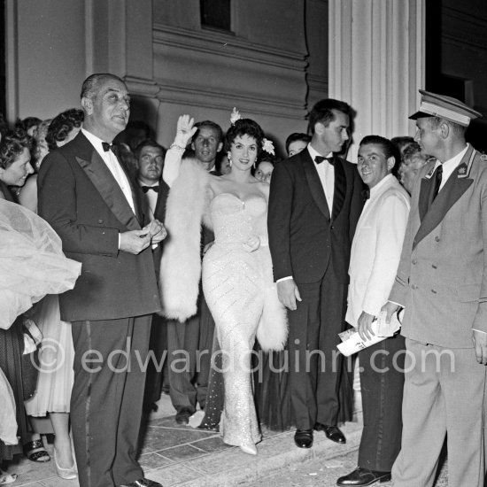 Gina Lollobrigida, centre of attraction, at the gala evening in aid of polio victims. Monte Carlo Sporting Club. Monte Carlo 1955. - Photo by Edward Quinn