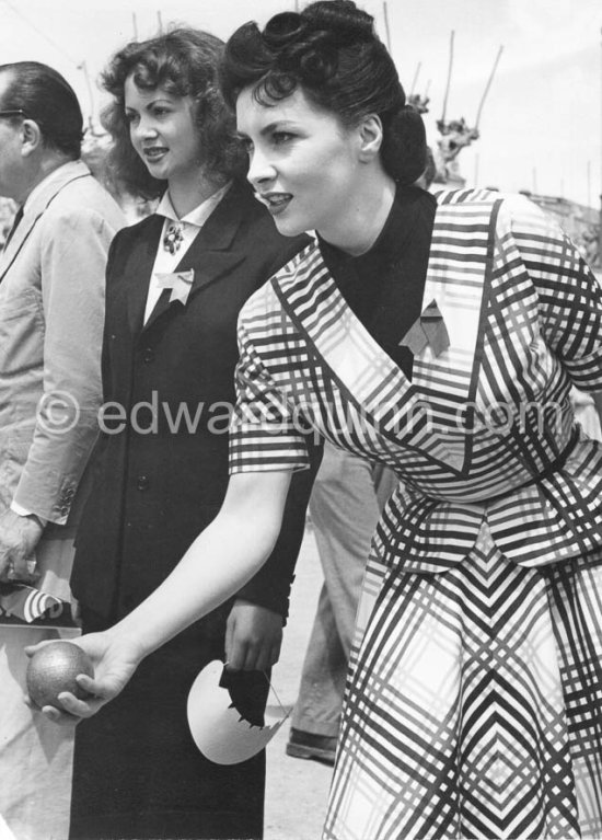 Gina Lollobrigida playing boule at Cannes 1952. - Photo by Edward Quinn