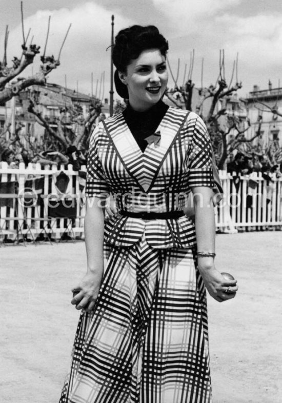Gina Lollobrigida playing boule at Cannes 1952. - Photo by Edward Quinn