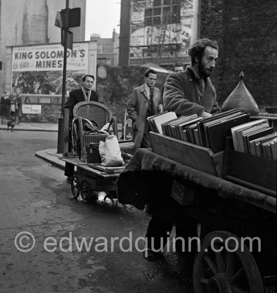 Second hand dealers. Tower Street,  a few meters up from the Upper Saint Martin\'s Lane, London, 1950 - Photo by Edward Quinn