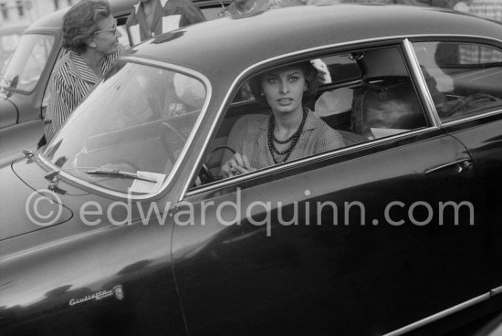 A lot of Italianità: Sophia Loren in an Alfa Romeo Giulietta Sprint. Cannes 1958. - Photo by Edward Quinn