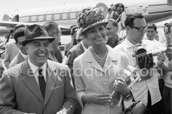 Sophia Loren and Carlo Ponti. Nice Airport 1961. - Photo by Edward Quinn