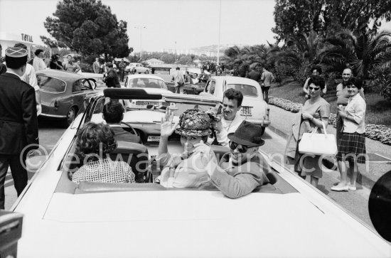 Sophia Loren and husband Carlo Ponti. Nice Airport 1961. Car: Ford Thunderbird 1961 Convertible. - Photo by Edward Quinn