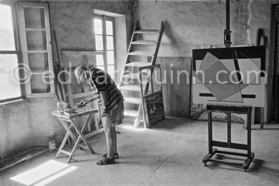 Alberto Magnelli at his studio La Ferrage, Plan-de-Grasse 1957. - Photo by Edward Quinn