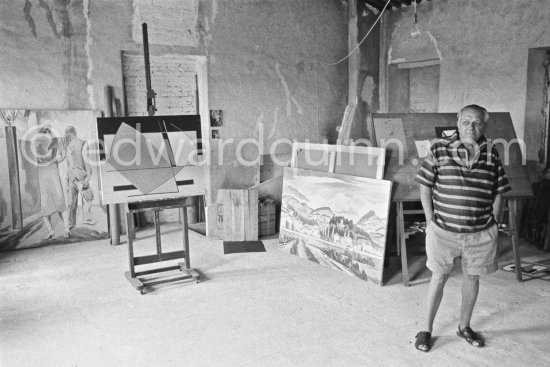 Alberto Magnelli at his studio La Ferrage, Plan-de-Grasse 1957. - Photo by Edward Quinn