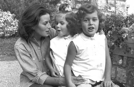 Silvana Mangano playing with her daughters Veronica (left) and Rafaela in the gardens of her villa, Roquebrune-Cap Martin 1955. She was married to the film producer Dino De Laurentiis. - Photo by Edward Quinn