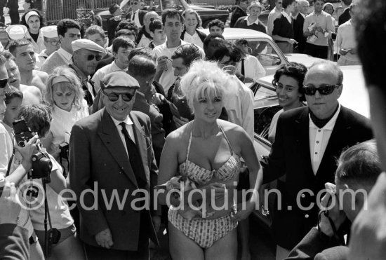 Curvy Jane Mansfield and her hardly recognizable Chihuahua. Cannes 1958. - Photo by Edward Quinn