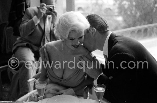 Jayne Mansfield, the bosomy blonde actress who loved to make the headlines, at the Cannes Film Festival in 1958 with her new husband, Mickey Hargitay, the ex-muscleman from Mae West’s nightclub. Cannes 1958. - Photo by Edward Quinn