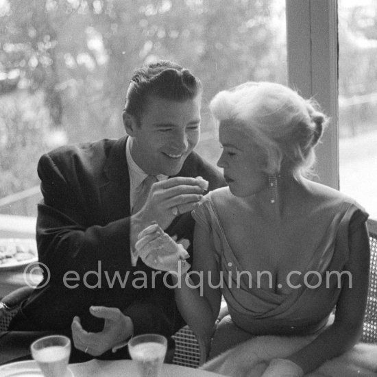 Jayne Mansfield, the bosomy blonde actress who loved to make the headlines, at the Cannes Film Festival in 1958 with her new husband, Mickey Hargitay, the ex-muscleman from Mae West’s nightclub. Cannes 1958. - Photo by Edward Quinn