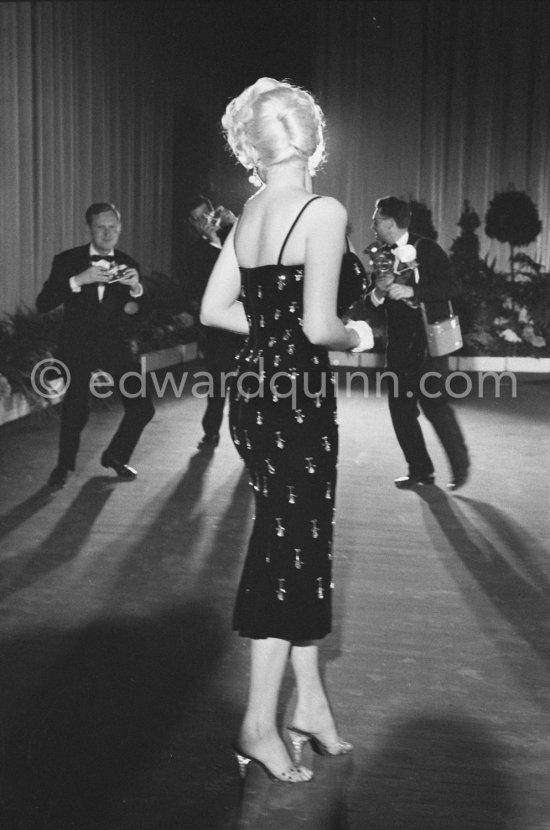 Jayne Mansfield and the dance of the photographers. Cannes Film Festival 1958. - Photo by Edward Quinn