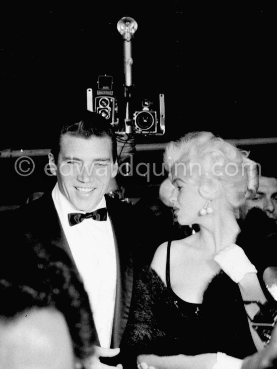 Jayne Mansfield, the bosomy blonde actress who loved to make the headlines, at the Cannes Film Festival in 1958 with her new husband, Mickey Hargitay, the ex-muscleman from Mae West’s nightclub. Cannes 1958. - Photo by Edward Quinn