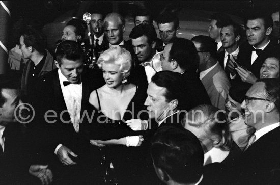 Jayne Mansfield, the bosomy blonde actress who loved to make the headlines, at the Cannes Film Festival in 1958 with her new husband, Mickey Hargitay, the ex-muscleman from Mae West’s nightclub. Cannes 1958. - Photo by Edward Quinn