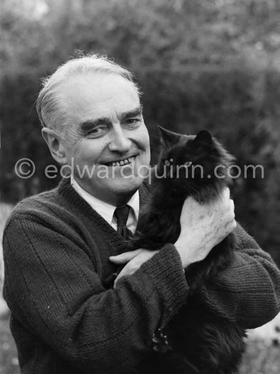 Bruce Marshall with one of his many cats (guess which one: Sammy, Joshua Dew Choir, Casiano, Hengist, Geddes Bijou, Emma, Enzo, Fan-Fan-la-TuIipe, Bunter). Cap d'Antibes 1953. - Photo by Edward Quinn
