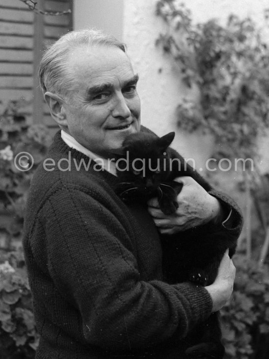 Bruce Marshall with one of his many cats (guess which one: Sammy, Joshua Dew Choir, Casiano, Hengist, Geddes Bijou, Emma, Enzo, Fan-Fan-la-TuIipe, Bunter). Cap d\'Antibes 1953. - Photo by Edward Quinn