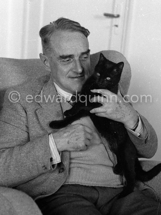 Bruce Marshall with one of his many cats (guess which one: Sammy, Joshua Dew Choir, Casiano, Hengist, Geddes Bijou, Emma, Enzo, Fan-Fan-la-TuIipe, Bunter). Cap d'Antibes 1953. - Photo by Edward Quinn