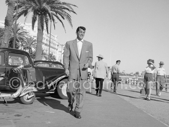 Dean Martin came to the Riviera after having entertained troops in France. Very elegantly dressed, remarked the locals, he walks along the Carlton beach. Cannes 1953. Car: Citroën Traction Avant 11BL Légère - Photo by Edward Quinn
