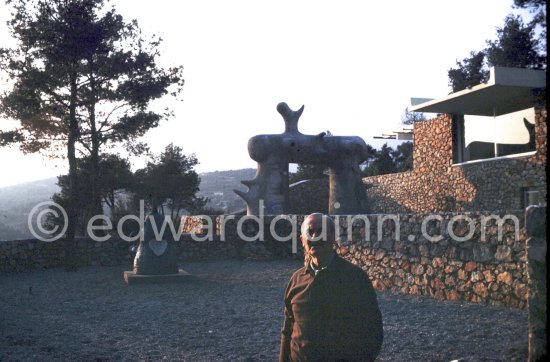 Joan Miró in the gardens of Musée Maeght with "L\'Arc" ("The Arch"), 1963. at the Fondation Maeght. Saint-Paul-de-Vence 1964. - Photo by Edward Quinn