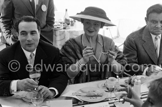 Edwige Feuillère and François Mitterrand at lunch during the Cannes Film Festival 1956. - Photo by Edward Quinn