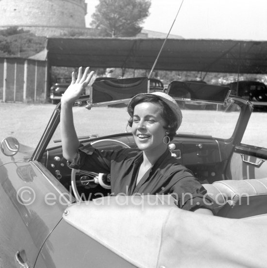 Young Lady with hat, Cap d\'Antibes c. 1955. Car: Porsche 356 A (1955 ?). - Photo by Edward Quinn