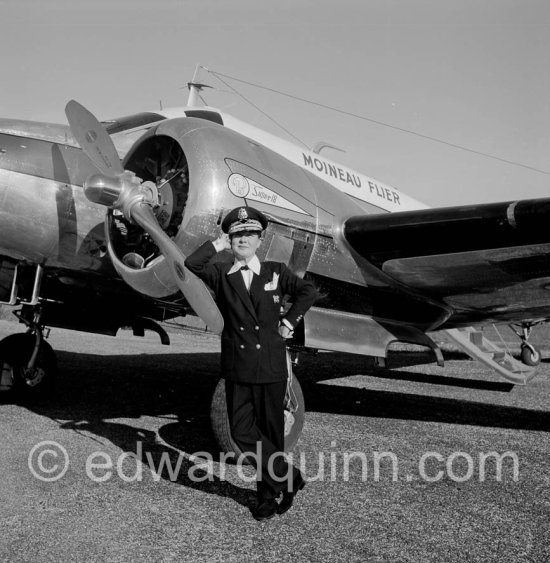 La Môme Moineau (the kid sparrow), "the richest woman of the Côte d\'Azur", former flower seller married to husband Mr. Benítez-Rexach, Dominican ship building millionaire. With one of her husbands gifts, a Beech 18 (85’000’000 francs). Cannes Airport 1954. - Photo by Edward Quinn