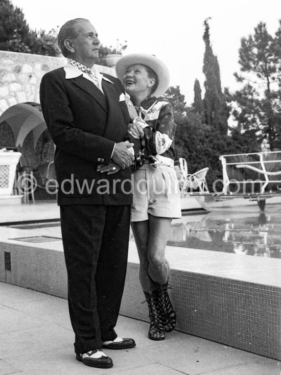 La Môme Moineau (the kid sparrow), "the richest woman of the Côte d\'Azur", former flower seller, and her husband Félix Benítez-Rexach, Dominican ship building millionaire. Cannes 1954. - Photo by Edward Quinn