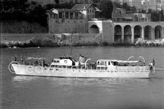 Aristotle Onasssis on board his yacht Christina. Monaco harbor 1956. - Photo by Edward Quinn