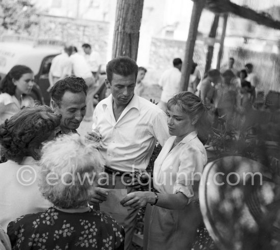 Simone Signoret, French actress often hailed as one of France’s greatest movie stars, on her wedding in 1951 to actor and singer Yves Montand. At the same restaurant Colombe d’Or, Saint-Paul-de-Vence, where their romance began. - Photo by Edward Quinn