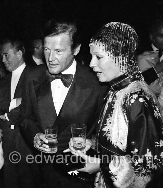 Roger Moores and his wife Luisa Mattioli. Wedding Party of Curd Jürgens and Margie, La Vieille Bastide, Saint-Paul-de-Vence 1978 - Photo by Edward Quinn