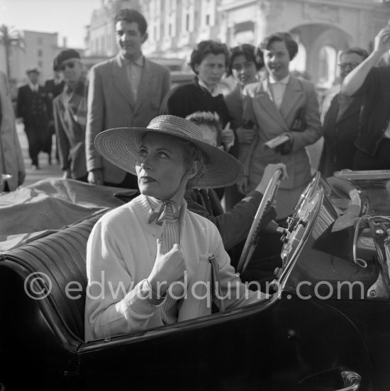 A must for a star at the Cannes Film Festival: a drive in an open car on La Croisette. Michèle Morgan, Cannes 1954. Car: MG TF 1953-1955 (round door binges) - Photo by Edward Quinn