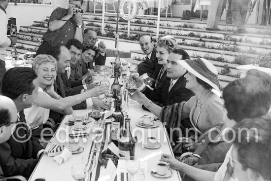 Michèle Morgan, François Mitterrand and Edwige Feuillère during the Cannes Film Festival 1956. - Photo by Edward Quinn