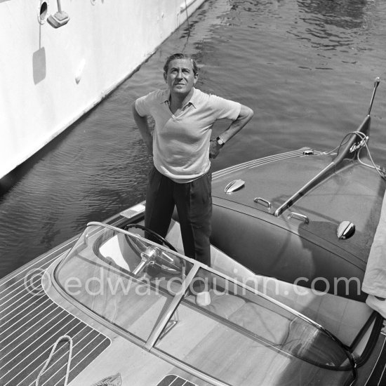 Stavros Niarchos on board the tender of his schooner Le Créole. Villefranche, Cap d’Antibes 1955. - Photo by Edward Quinn