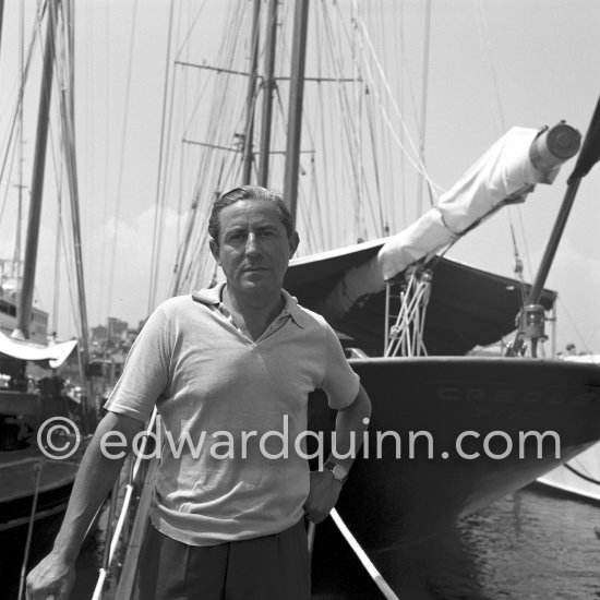 Stavros Niarchos in front of his schooner Le Créole. Villefranche 1955. - Photo by Edward Quinn