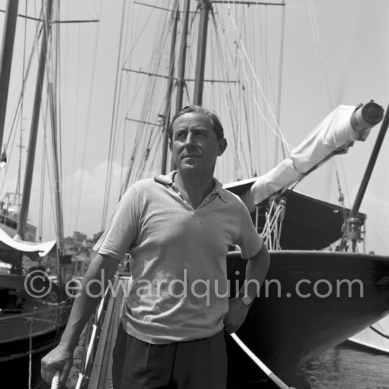 Stavros Niarchos in front of his schooner Le Créole. Villefranche 1955. - Photo by Edward Quinn