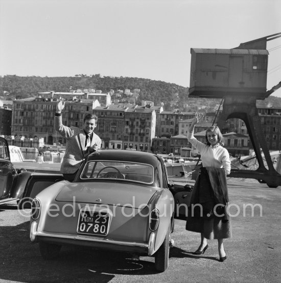 Magali Noël, French actress and singer, and Roberto Risso, actor, fiancé of Magali Noël. Nice 1957. Car: Fiat Nuova 1100/103 TV Trasformabile, standard version bodied by Reparto Carrozzerie Speciali Fiat Lingotto - Photo by Edward Quinn