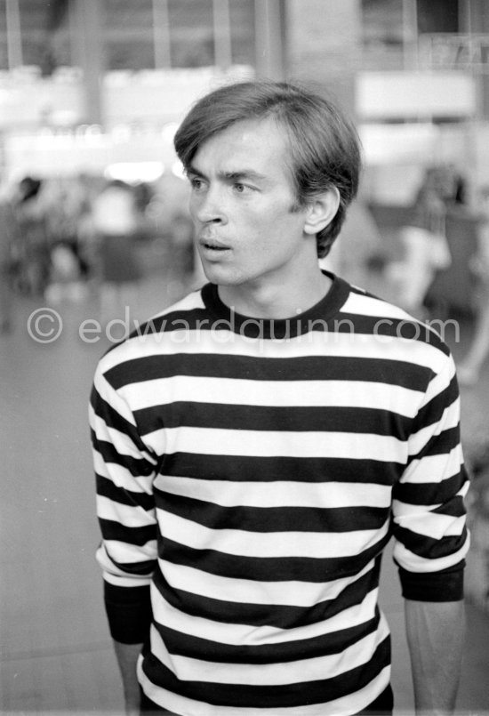 Rudolf Nureyev, Soviet dancer of ballet and modern dance, waiting for English ballerina Margot Fonteyn. Nice Airport 1963. - Photo by Edward Quinn