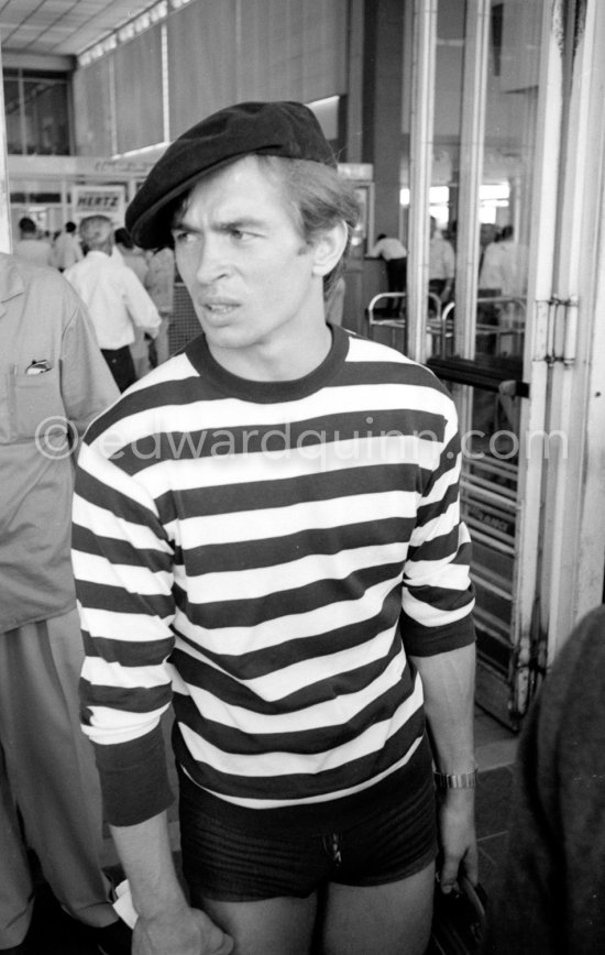 Rudolf Nureyev, Soviet dancer of ballet and modern dance, waiting for English ballerina Margot Fonteyn. Nice Airport 1963. - Photo by Edward Quinn