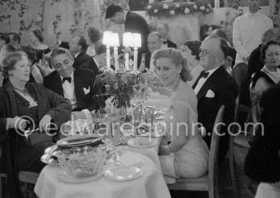 Aristotle Onassis, his guest Mrs Jacks, with on the right Tina Onassis and Mr. Jacks. "Bal de la Rose" gala dinner at the International Sporting Club in Monte Carlo, 1956. - Photo by Edward Quinn